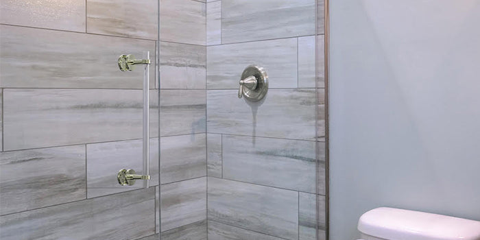 Brass and acrylic shower door pull